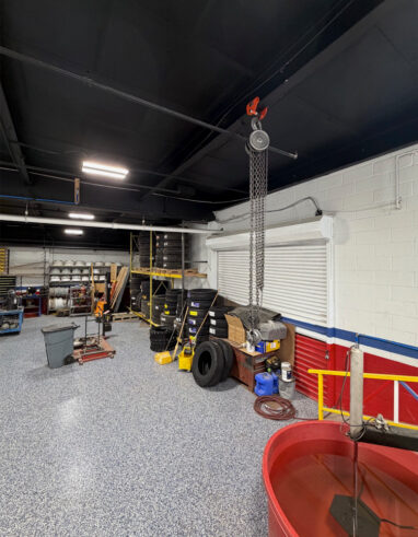 Tire rack inside of Good Deal Tires and Hydraulics shop