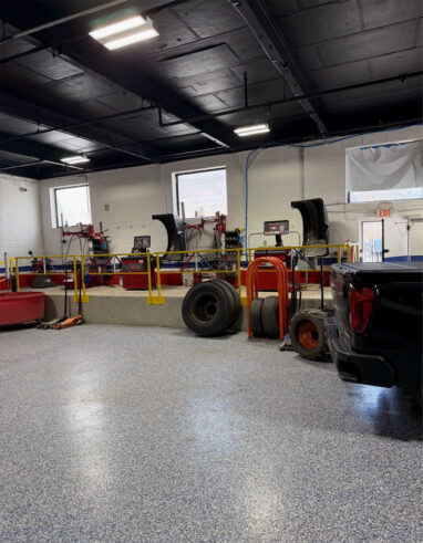 Tire Rack inside of Good Deal Tires and Hydraulics shop