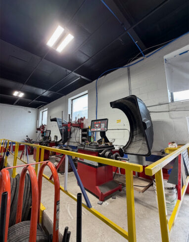 Tire rack inside of Good Deal Tires and Hydraulics shop